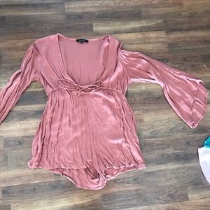 Romper from Princess Polly brand is olivaceous